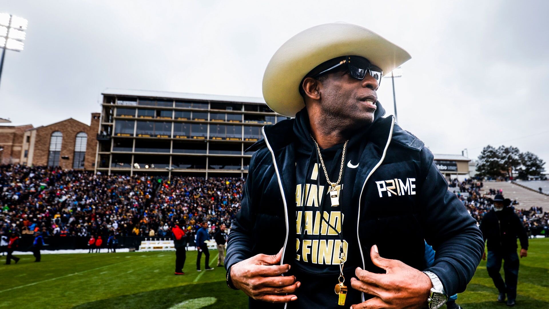 BOULDER, UNITED STATES - APRIL 22: University of Colorado football head coach Deion Sanders watches his players run onto the field before the Spring football game as part of Black and Gold Day on April 22, 2023. (Photo by Michael Ciaglo for The Washington Post via Getty Images)